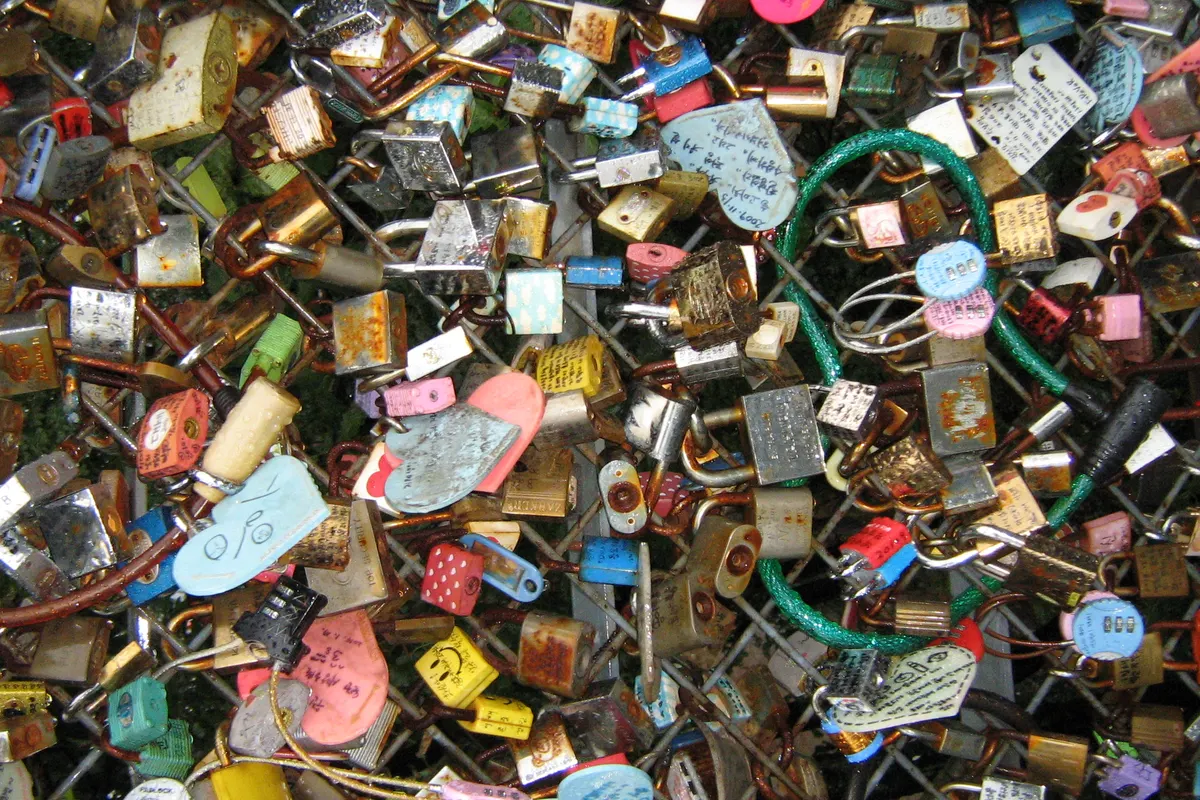 Colorful love locks and heart-shaped padlocks crowded onto the railings at N Seoul Tower on Namsan